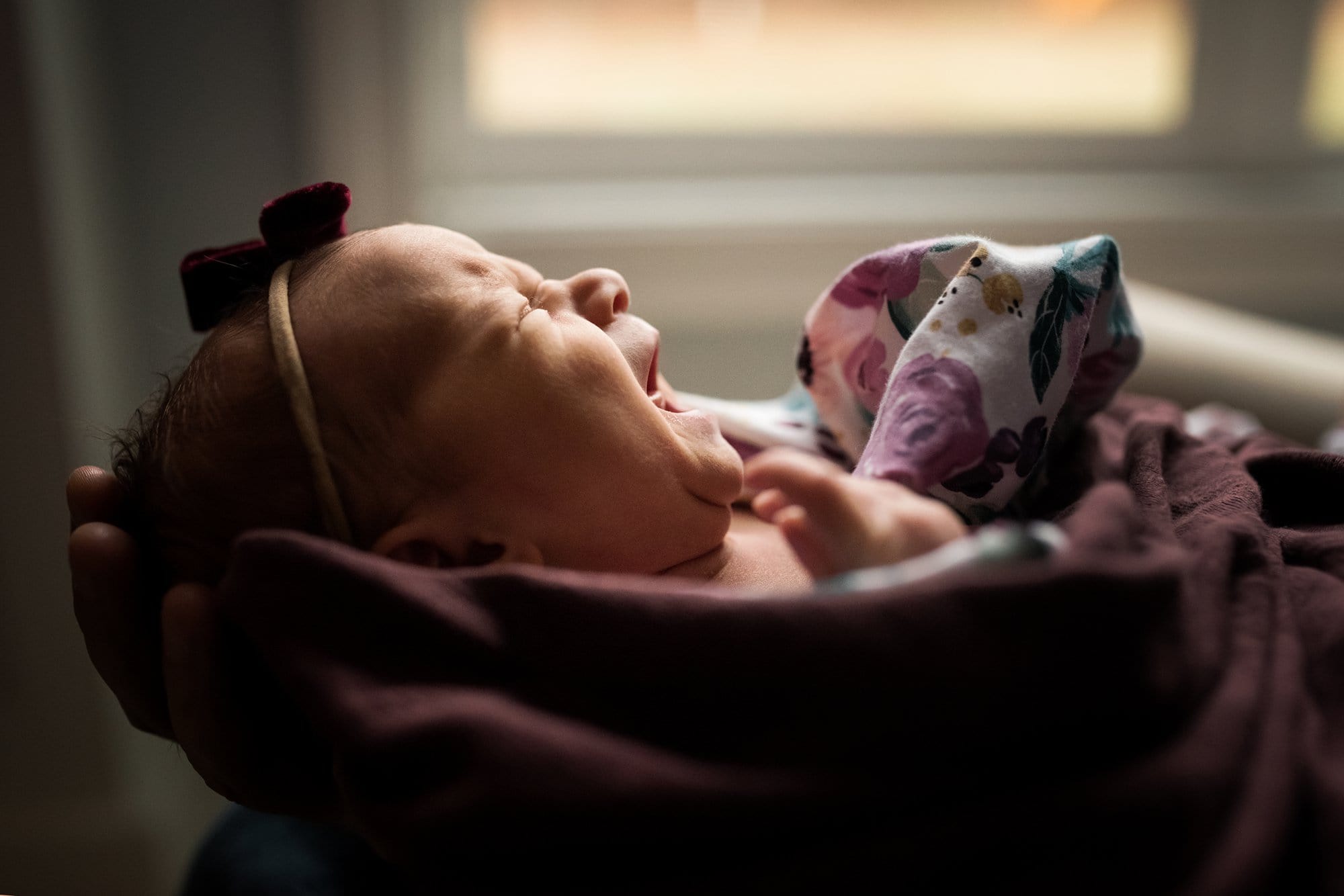 Newborn Lifestyle Photography in Perrysburg Ohio mother holding baby photo by Cynthia Dawson Photography