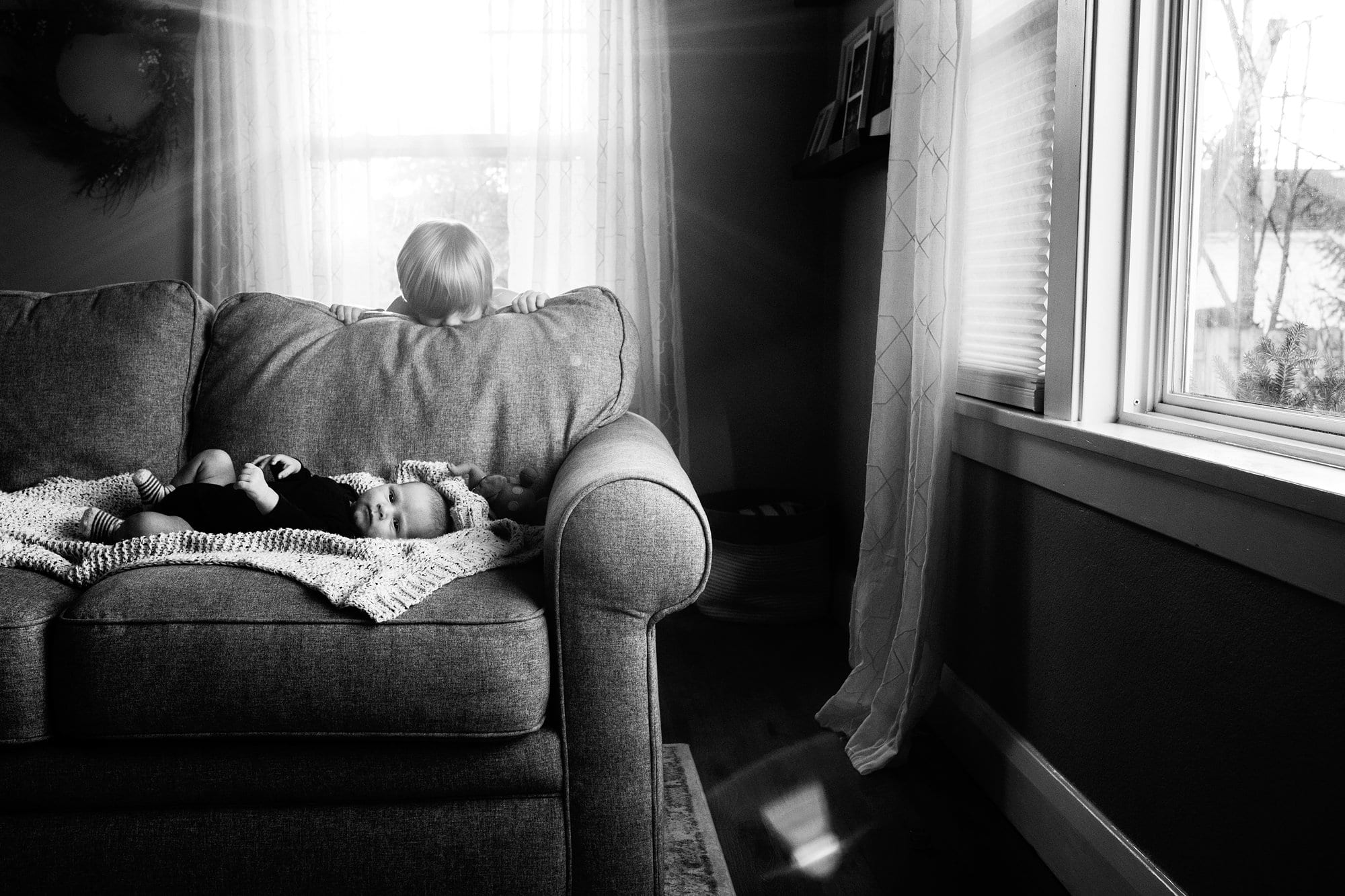 Northwest Ohio Newborn Photographer newborn with brother photo by Cynthia Dawson Photography 