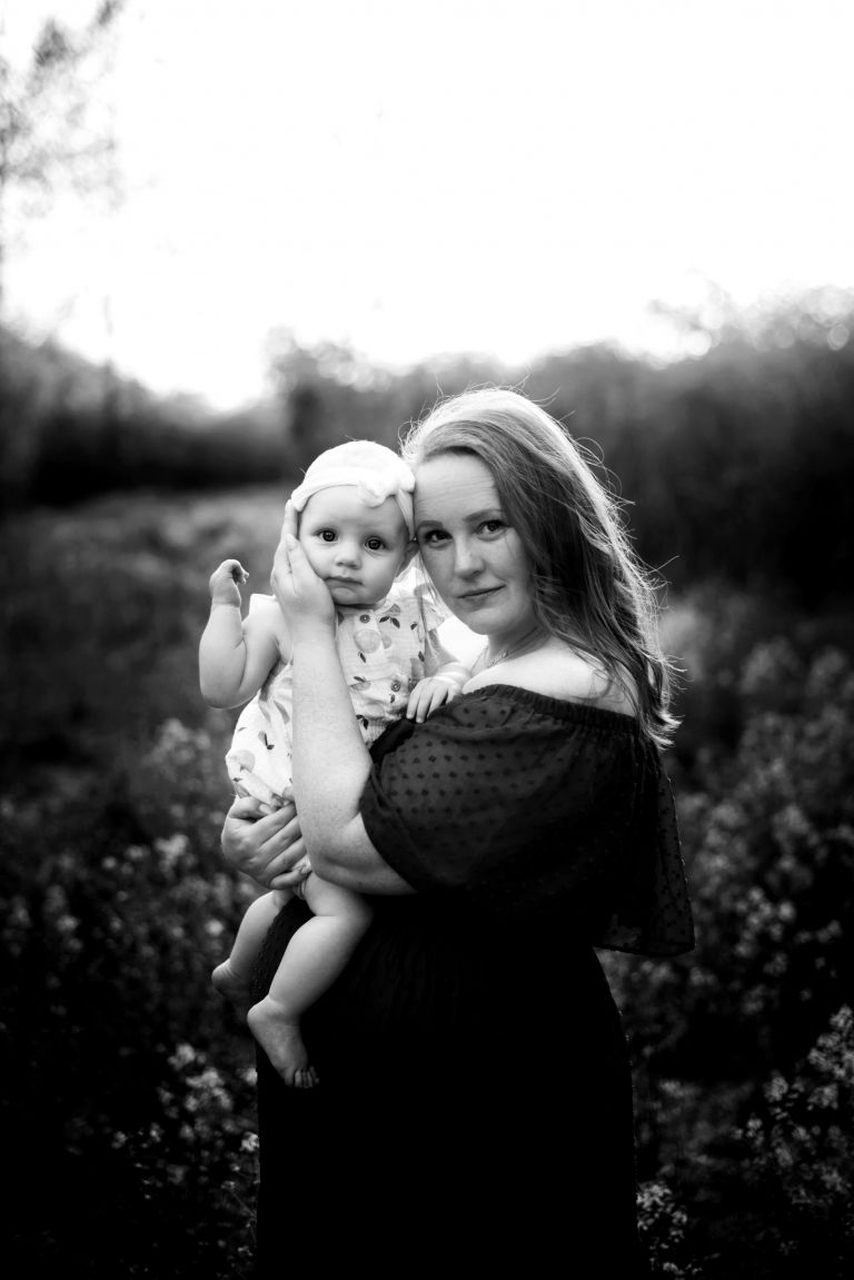 Maumee Family Photographer mother holding baby looking at camera photo by Cynthia Dawson Photogrpahy 