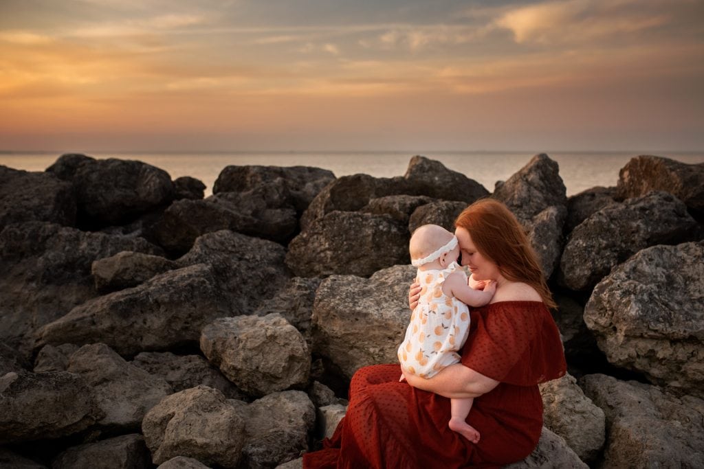 Maumee Family Photographer mother holding baby close photo by Cynthia Dawson Photogrpahy 