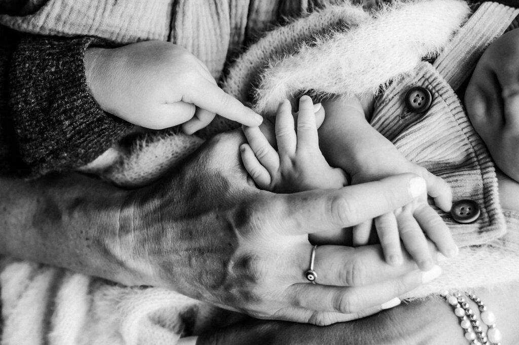 Photographing Siblings with a Newborn Baby