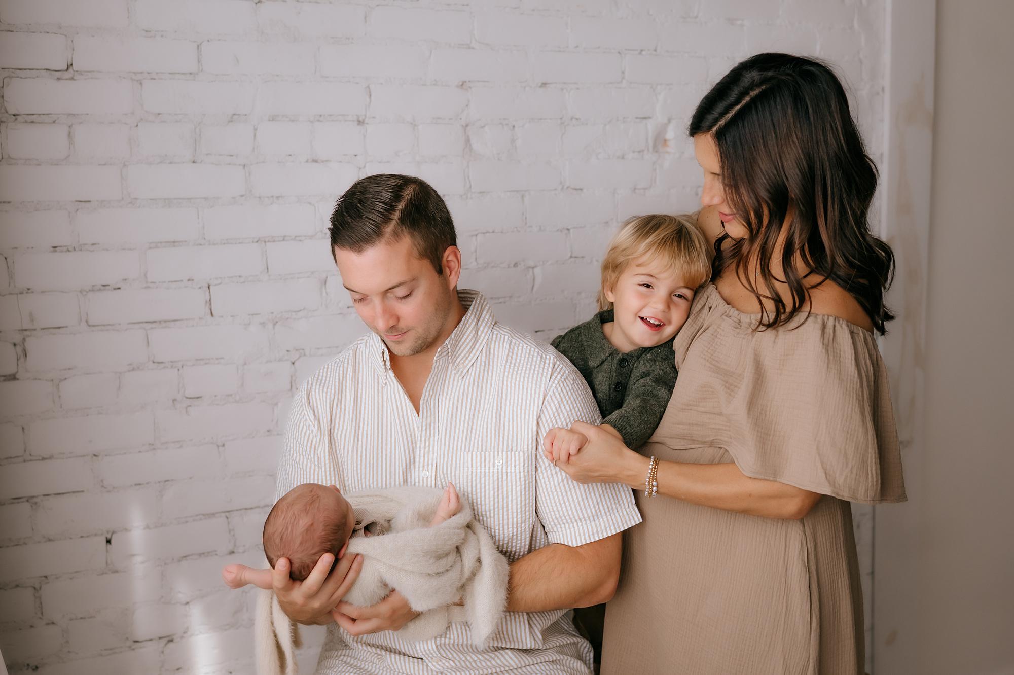 Photographing Siblings with a Newborn Baby