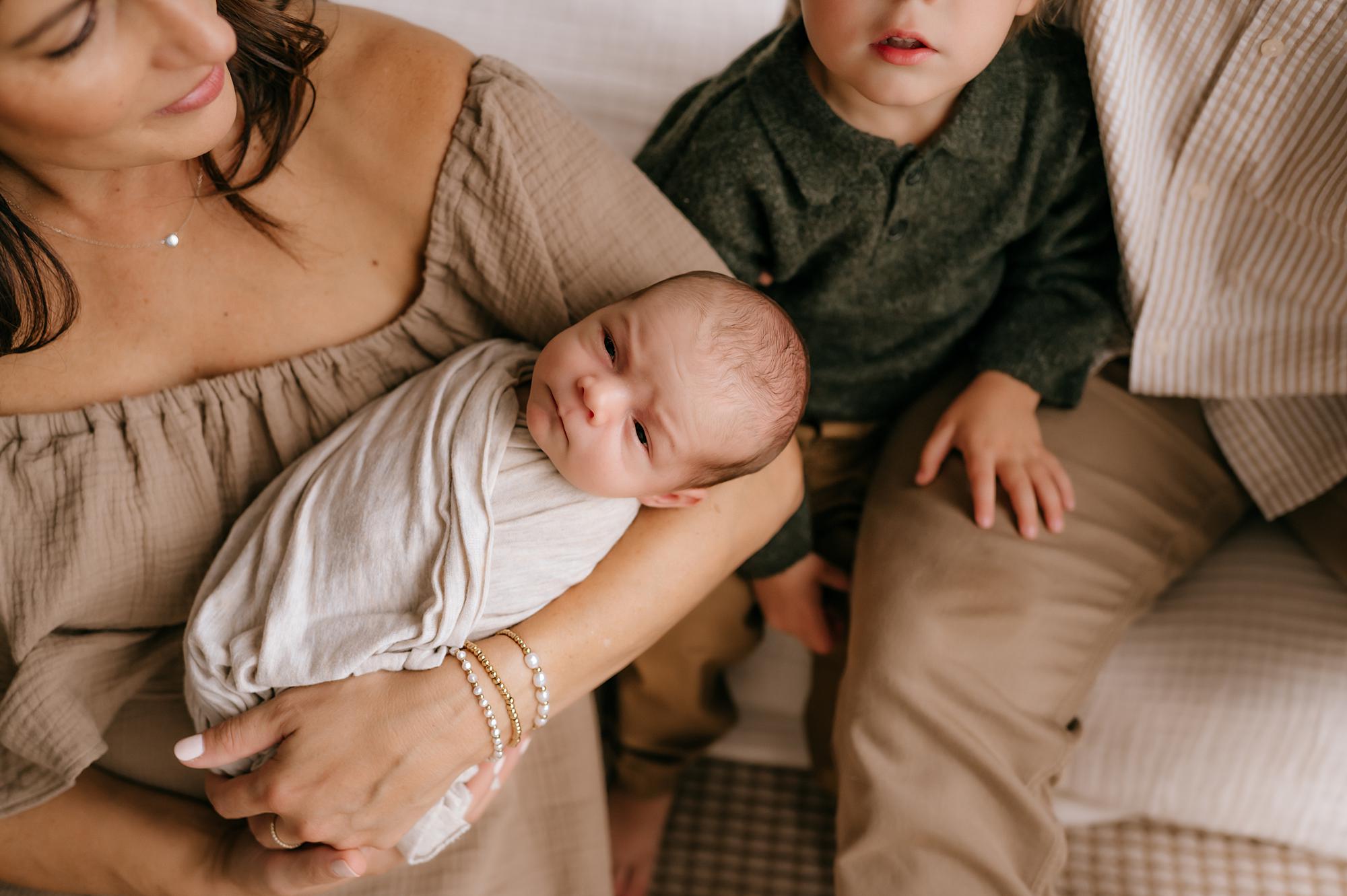 Photographing Siblings with a Newborn Baby